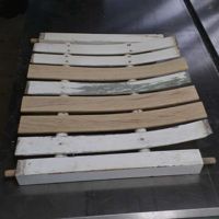 Steam-bent seat pieces to replace broken slats.