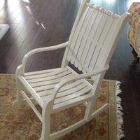 Repaired and refinished antique child's rocker.