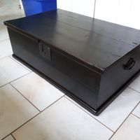 Repaired and refinished antique chest.